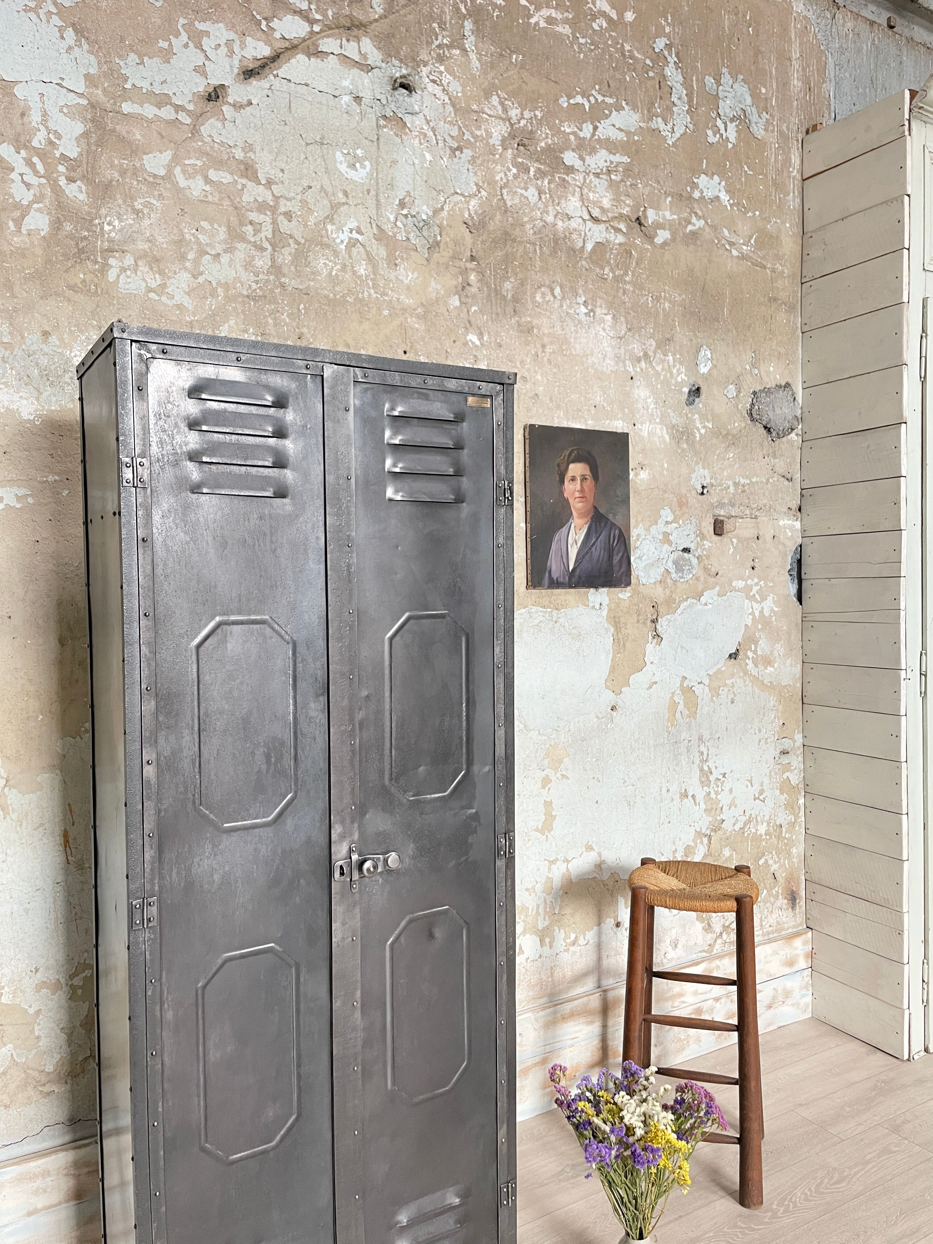 Industrial locker room in raw metal, circa 1930.
