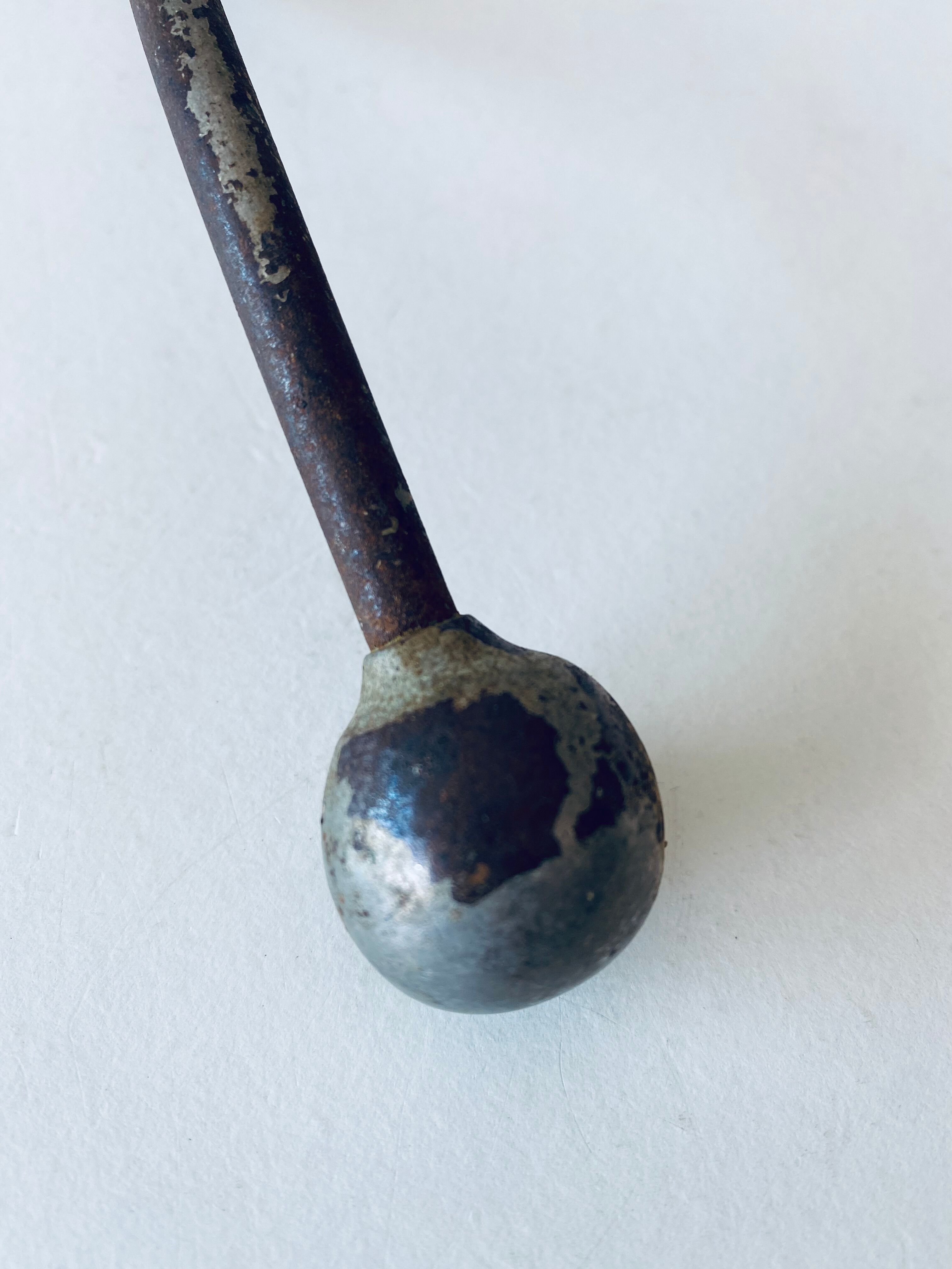 Ancient metal patère