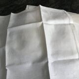 White damask table service consisting of a large tablecloth and 12 napkins