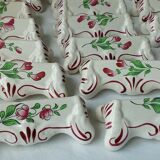 Suite of 18 knife holders in faience of luneville model reverbere