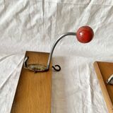 Pair of vintage wooden wall coat racks with three red ball hooks