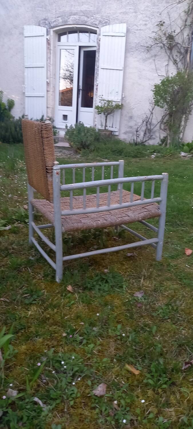 Rope-woven wooden armchair