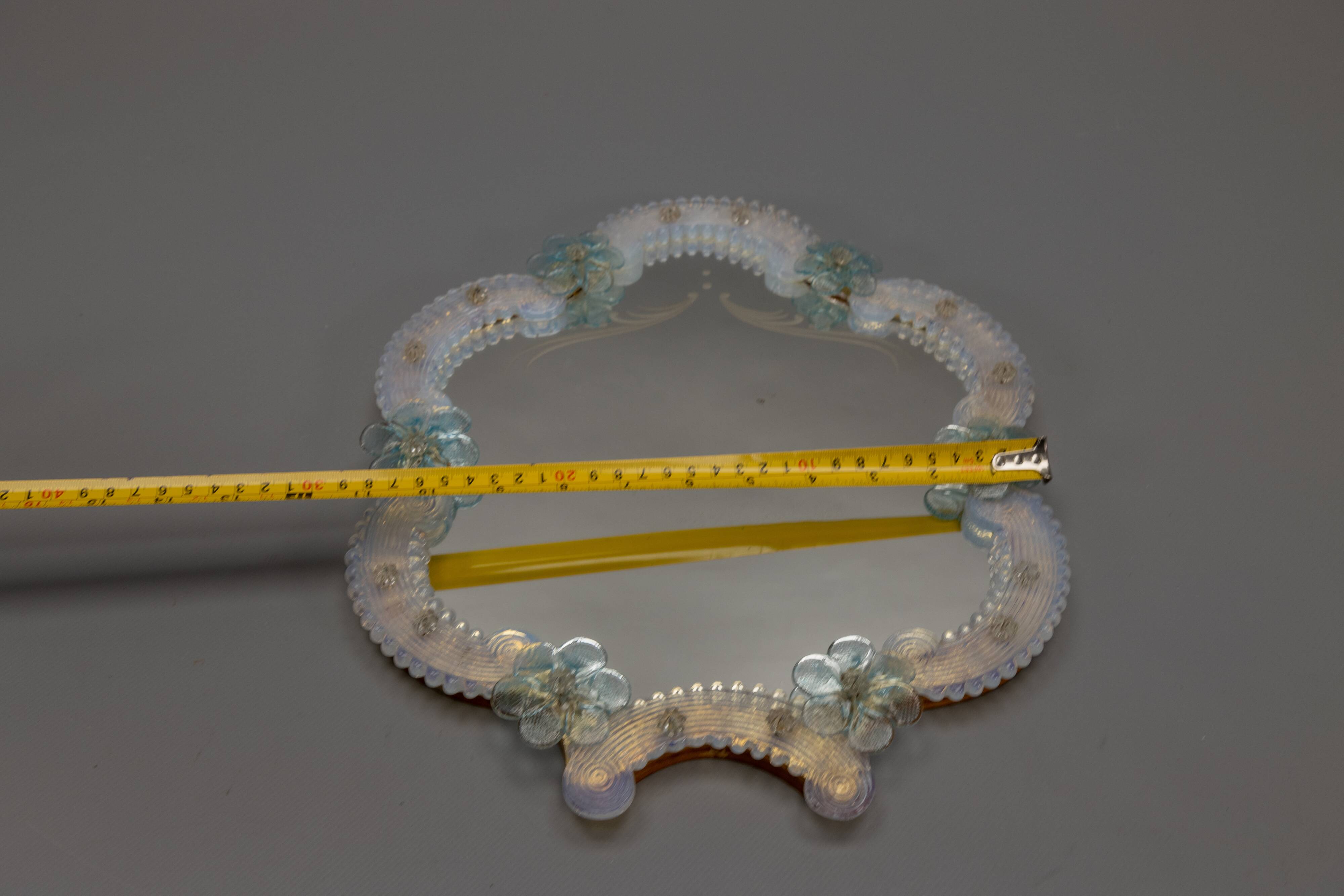 Italian Venetian Murano light blue and opalescent glass wall mirror, 1950s