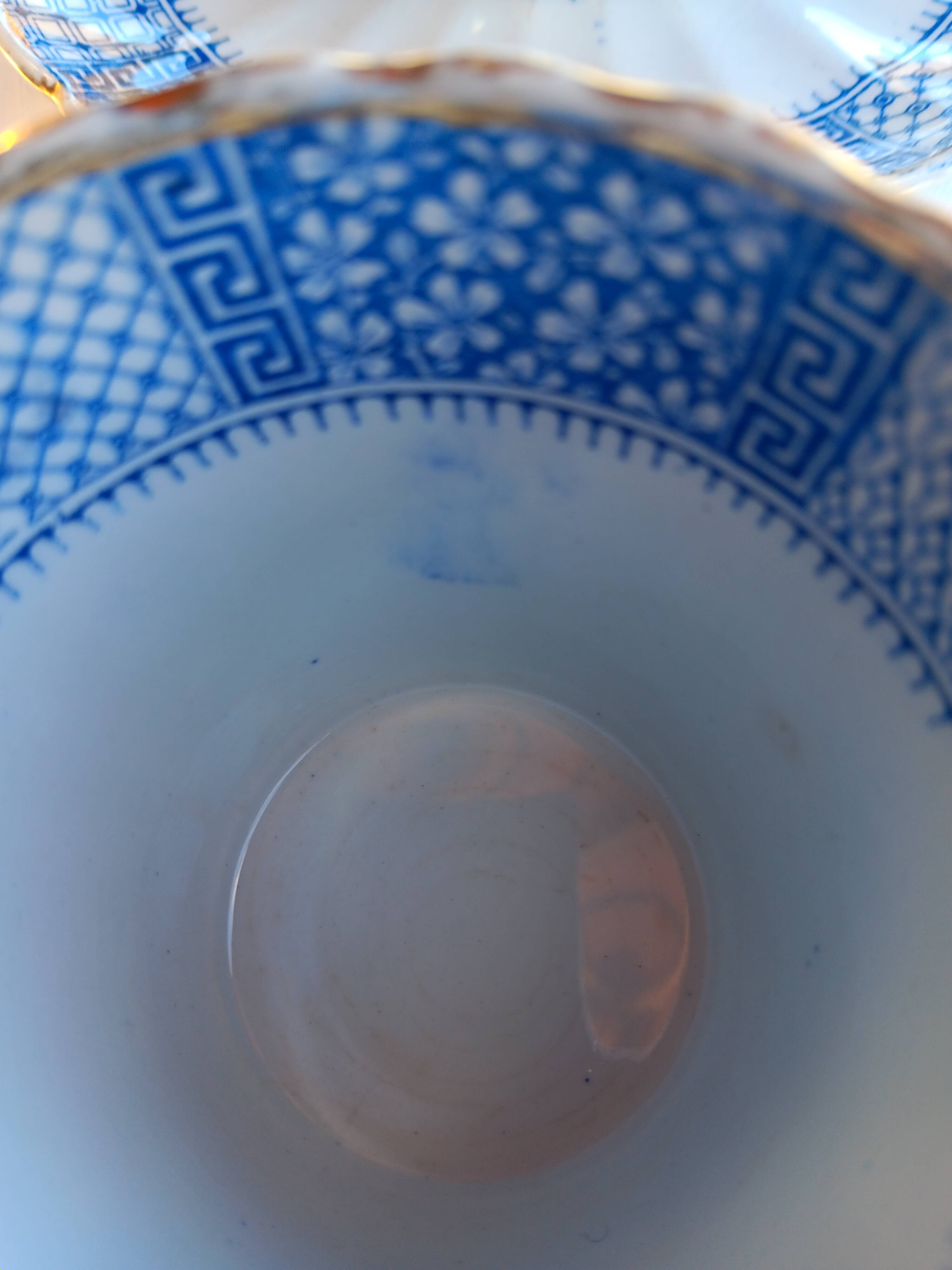 Old coffee service Lunéville with blue lace decoration.
