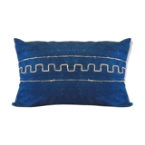 Cushion has Greek metis tie and dye pattern