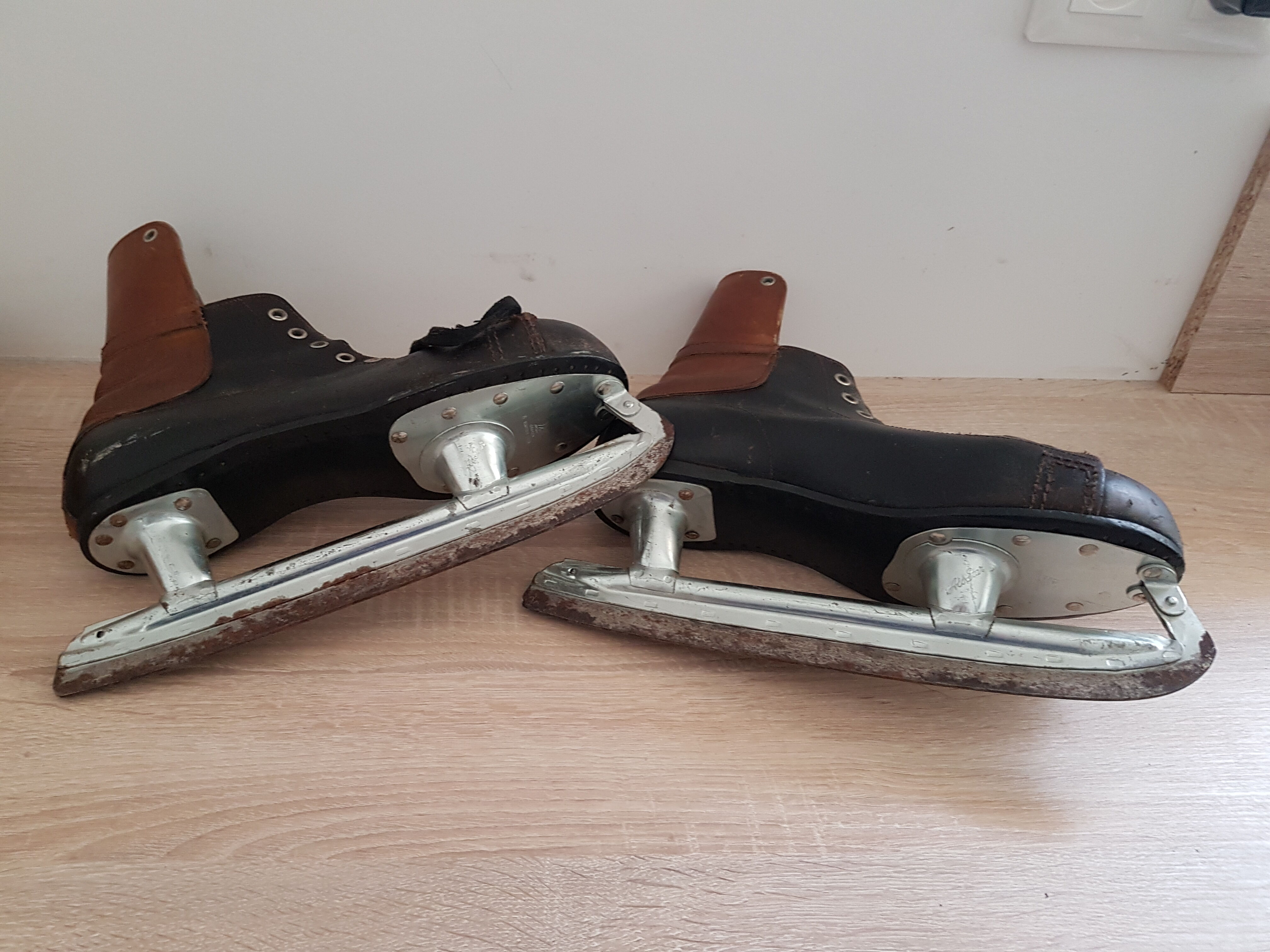 Pair of black and brown ice skates