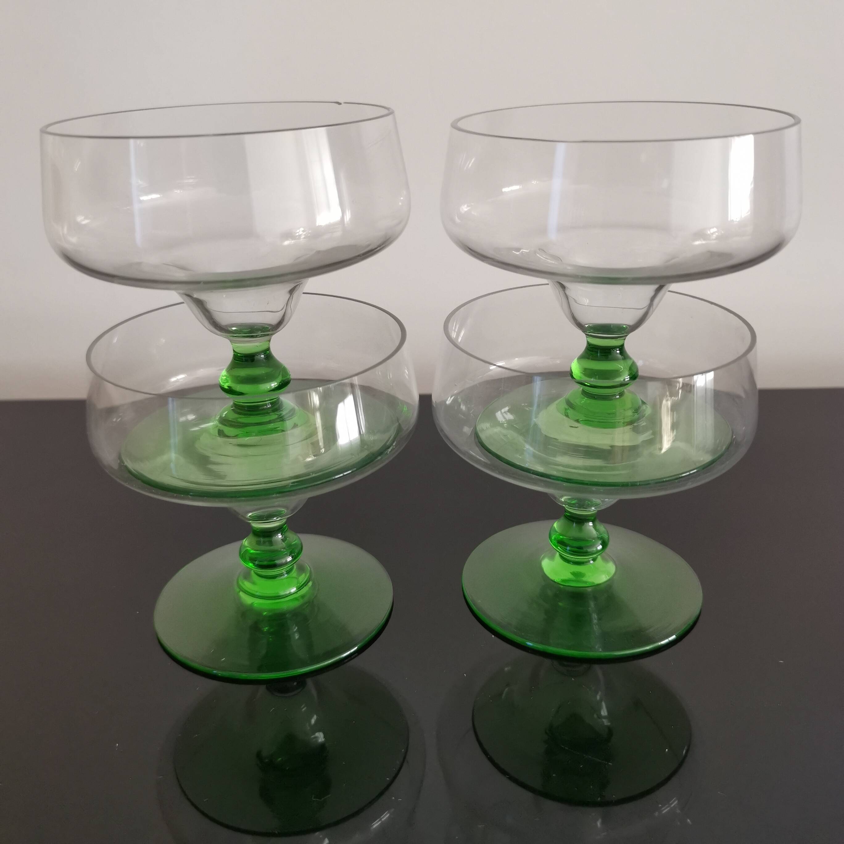Set of 4 champagne glasses on green legs, 1960s