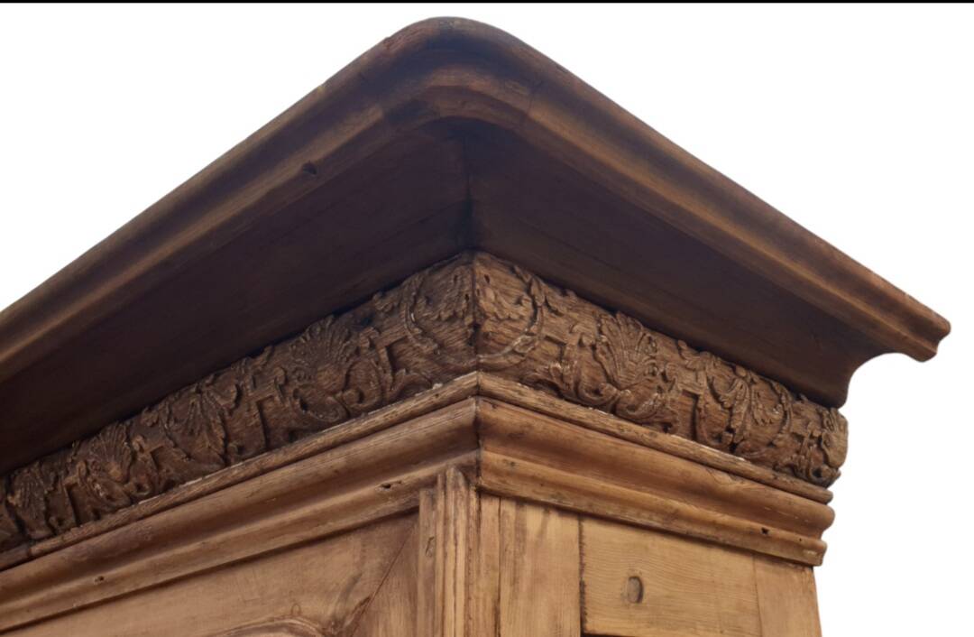 Natural wood bookcase with 3 doors and shelves