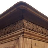 Natural wood bookcase with 3 doors and shelves