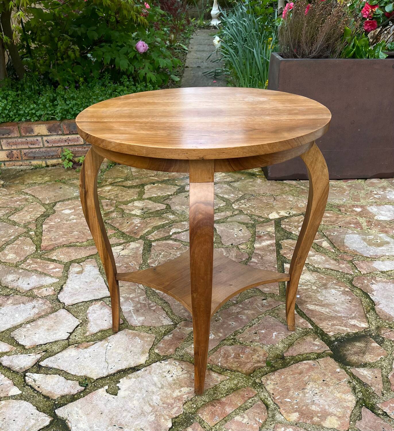 Old wooden pedestal table