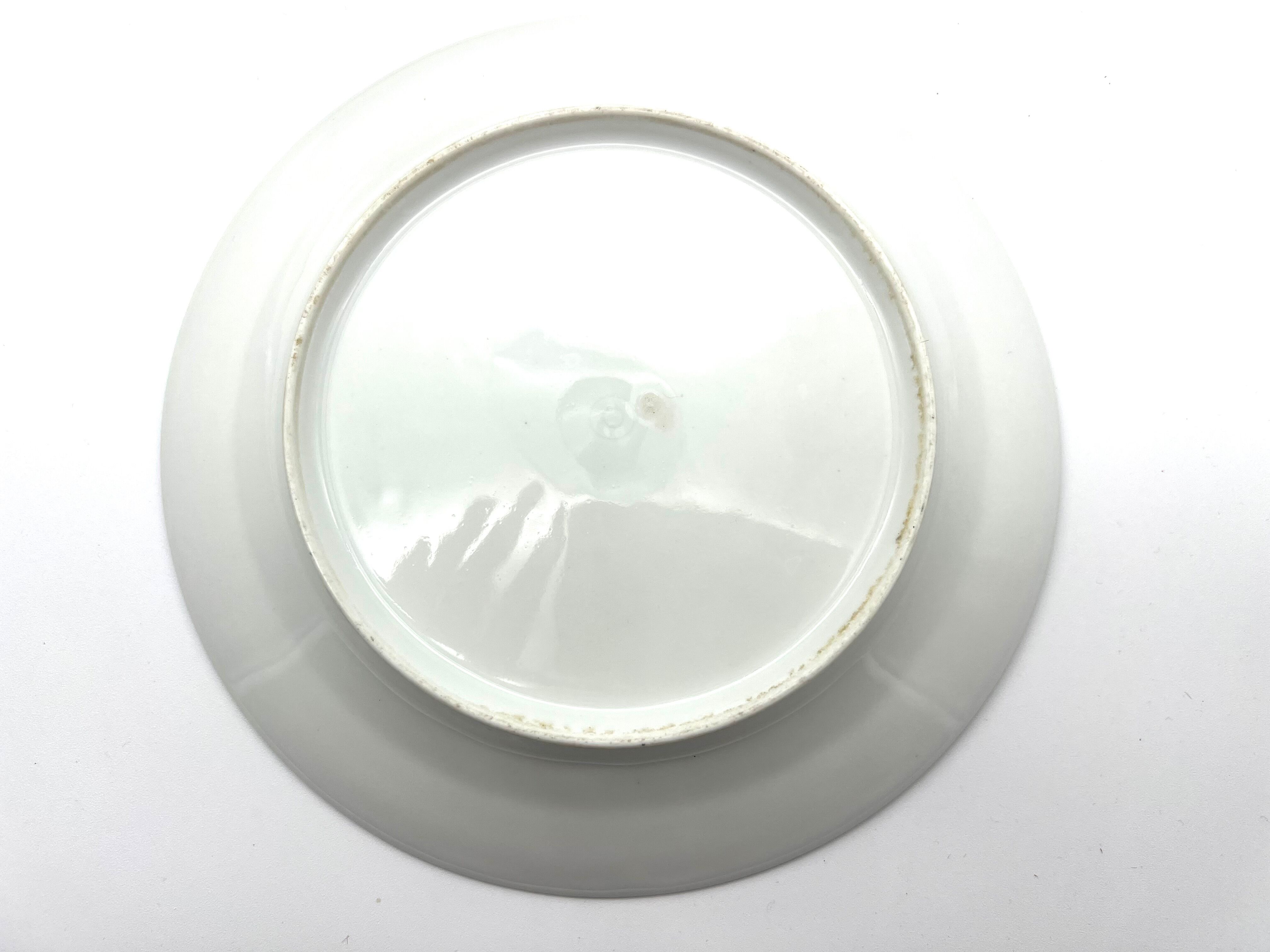 White and blue dessert plate with monogram BH