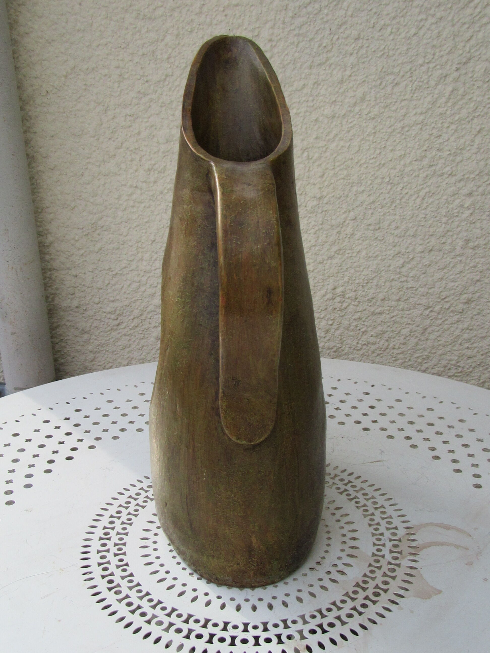 Glazed earthenware pitcher