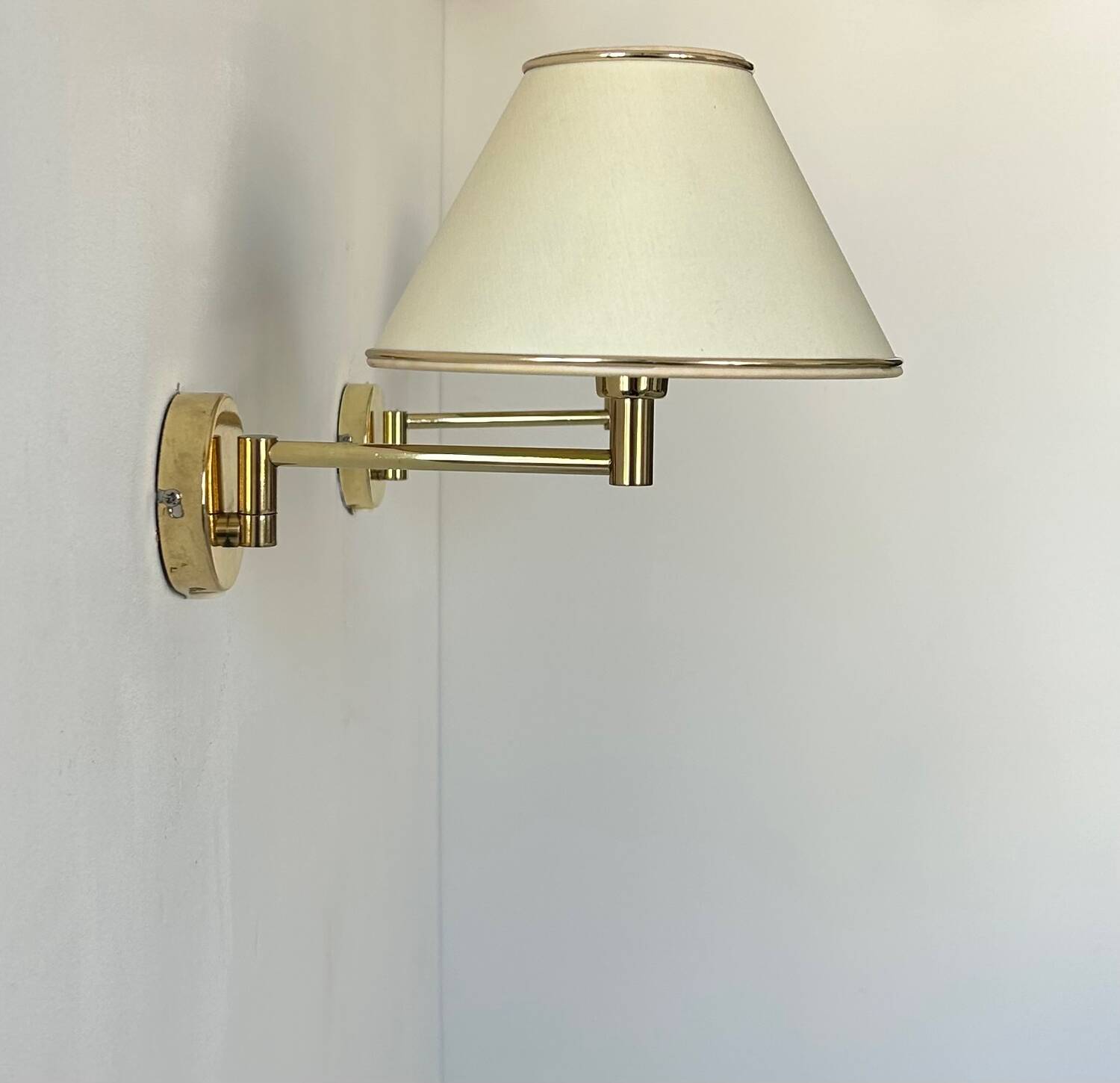 Vintage adjustable wall lamp, brass and beige fabric, France 1970