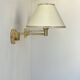 Vintage adjustable wall lamp, brass and beige fabric, France 1970