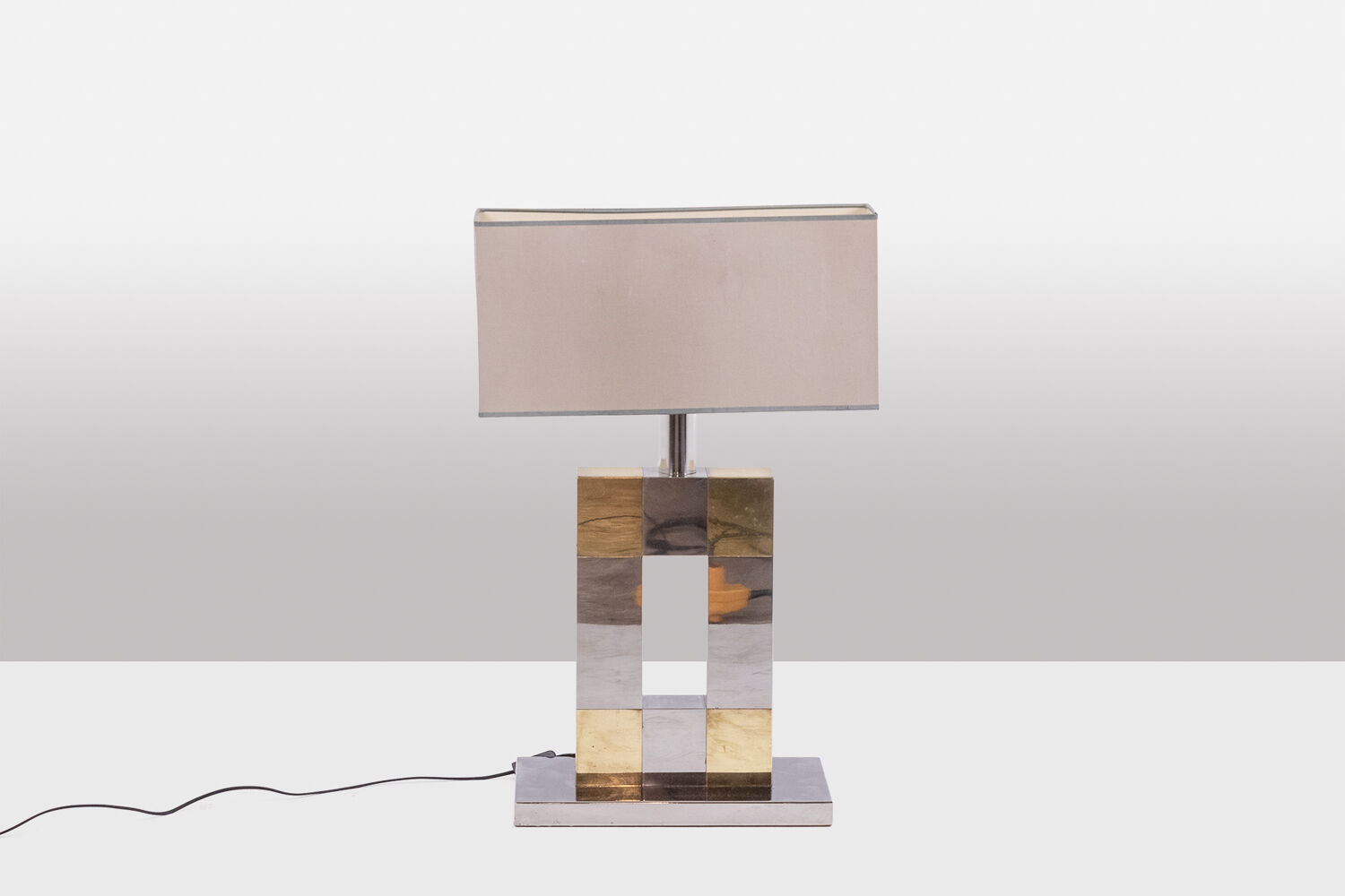 Sandro Petti. Geometric lamp in silvered and gilded metal. 1970s.
