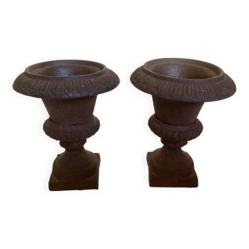 Pair of Médicis vase candlesticks in cast iron