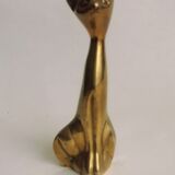 Trio of cats in gilded brass