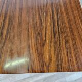 Extendable table in laminate