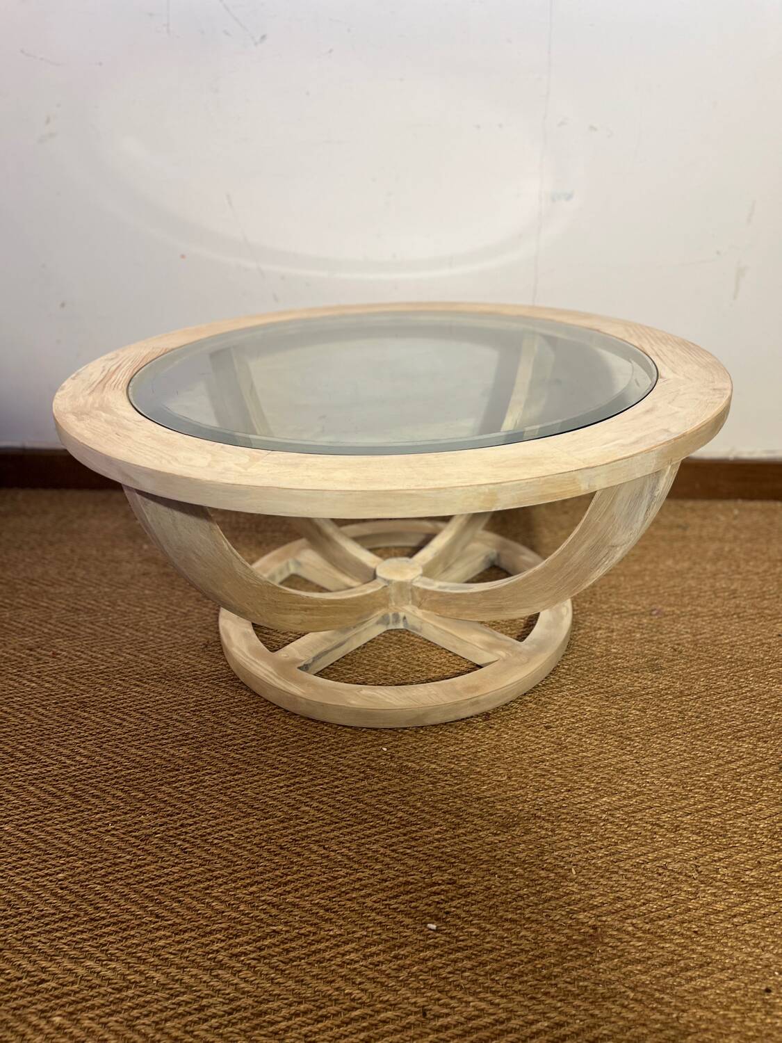 Oval patinated wood and beveled glass coffee table