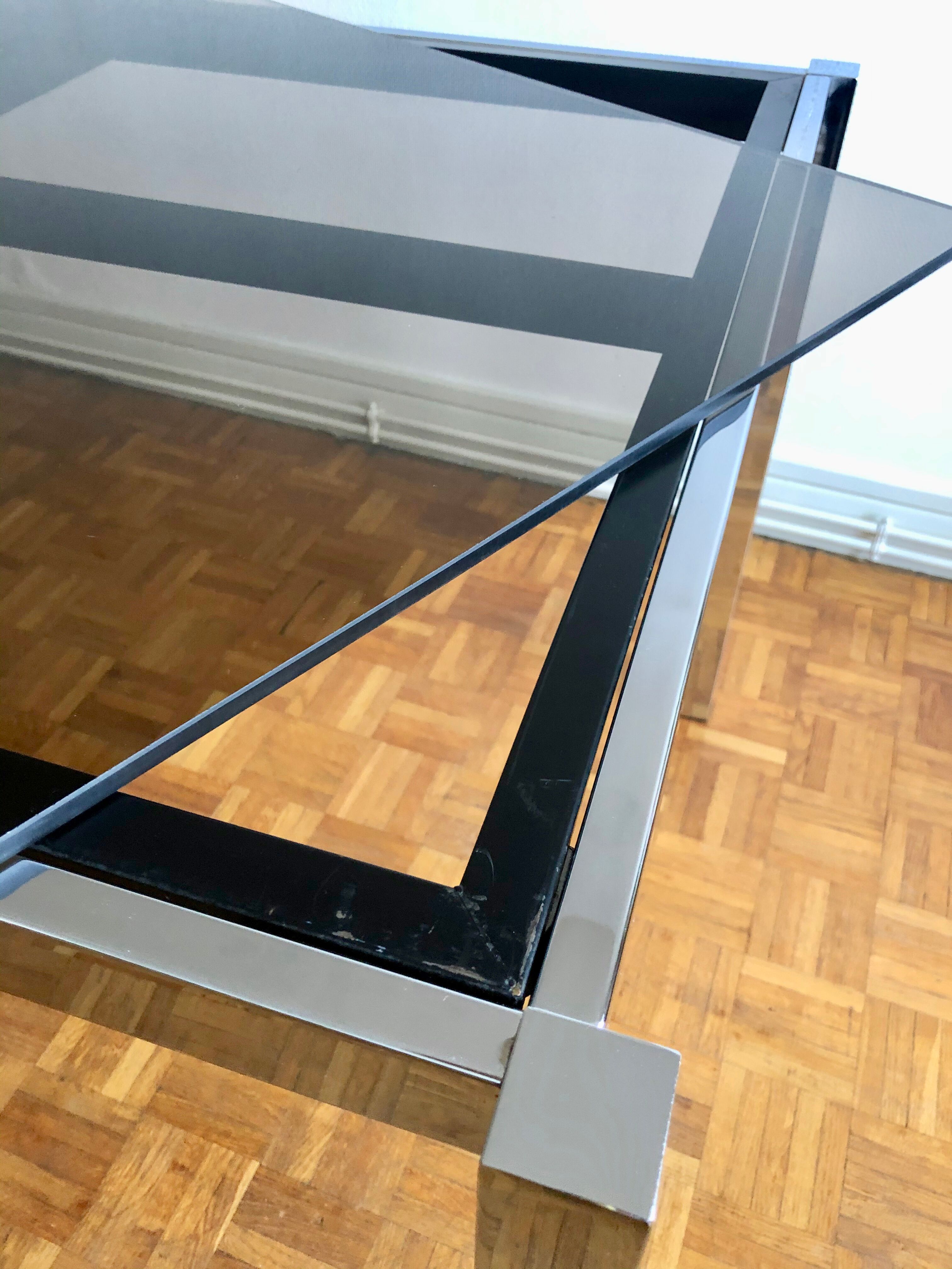 Glass and chrome metal dining table