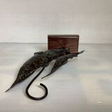 Small metal and wood fish statue
