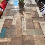 Magnificent wooden table with a glass top.