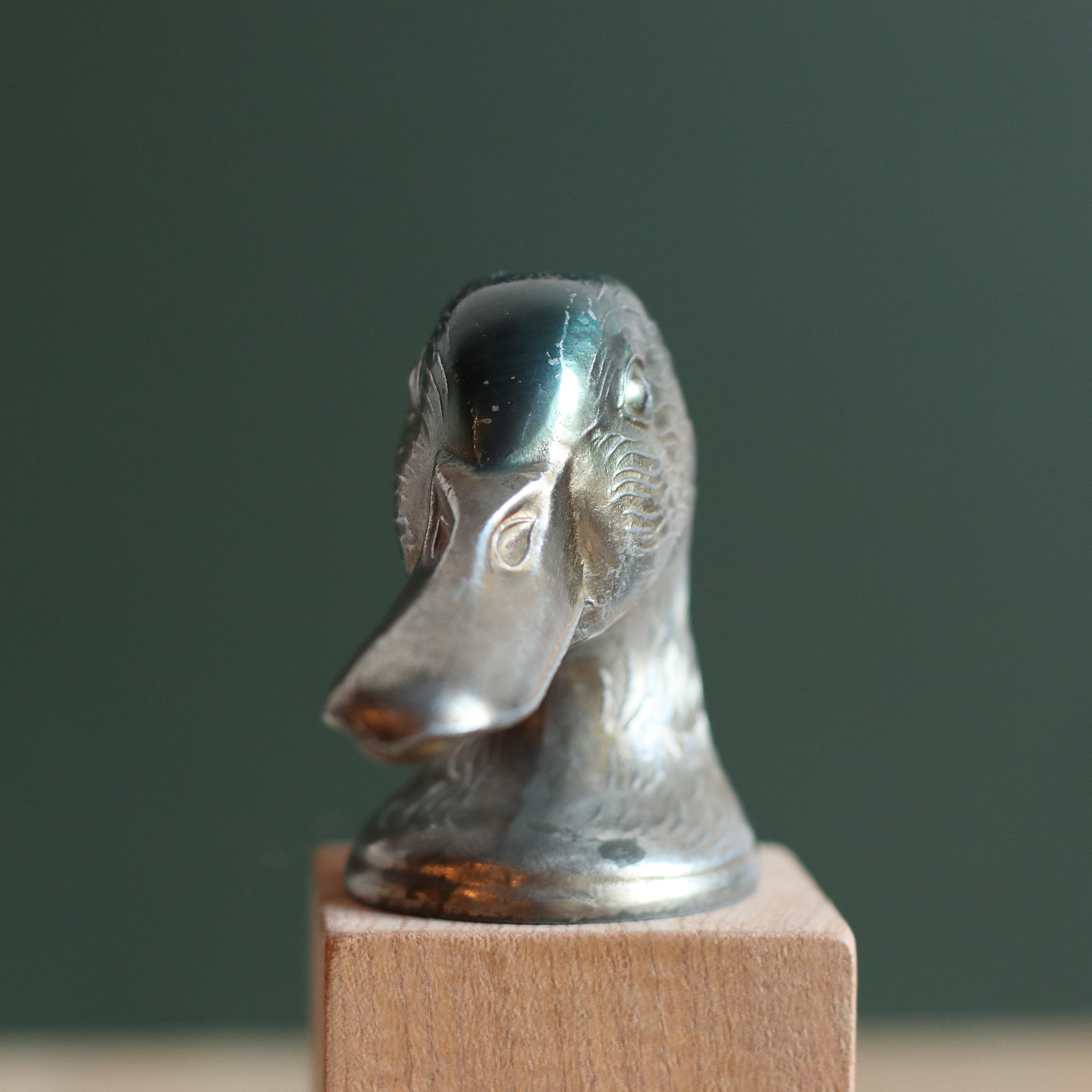 Vintage duck bottle opener signed Ducky in silver metal