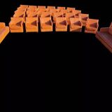 Pair of orange leather club chairs 1980