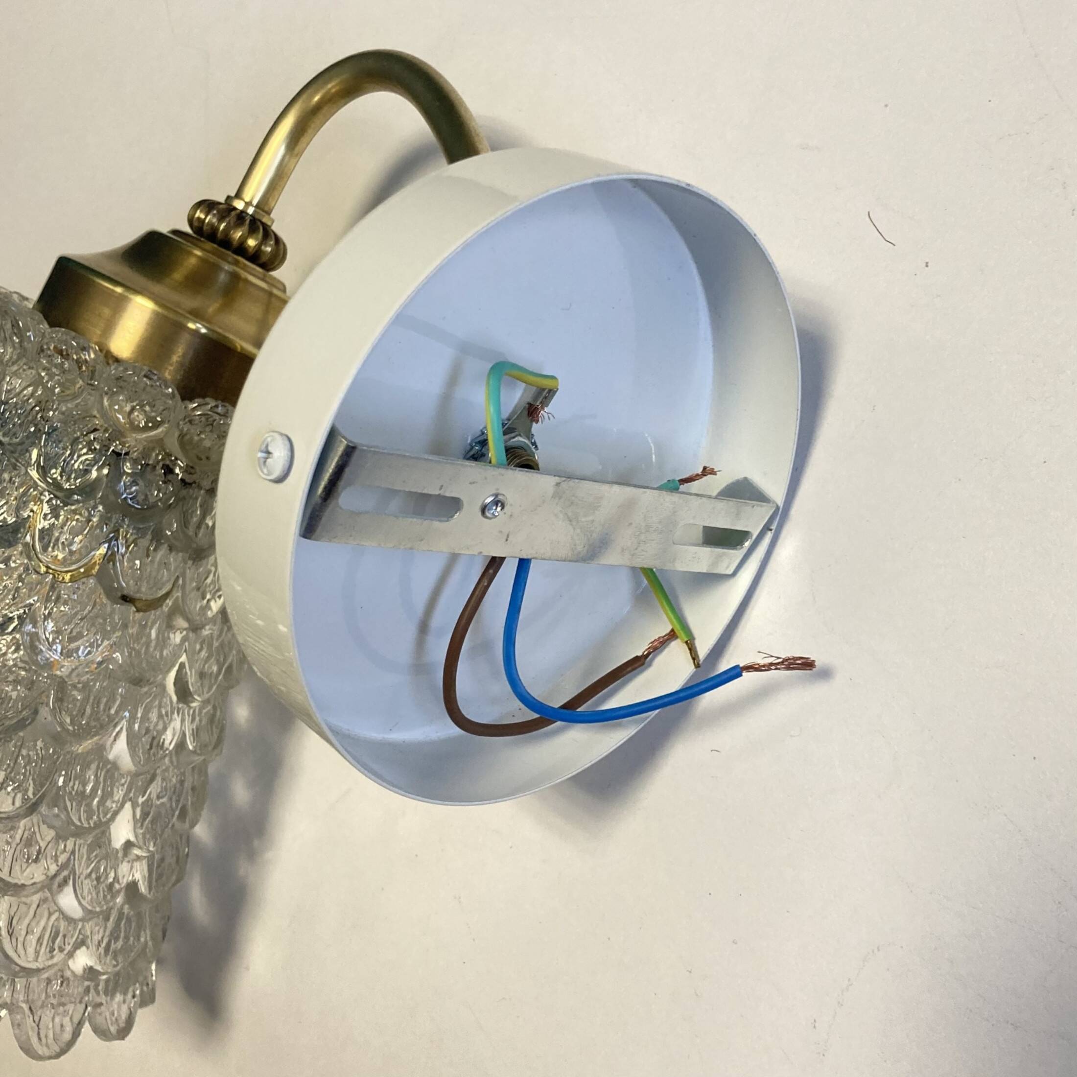 Old brass swan neck wall light and transparent glass tulip vintage decoration