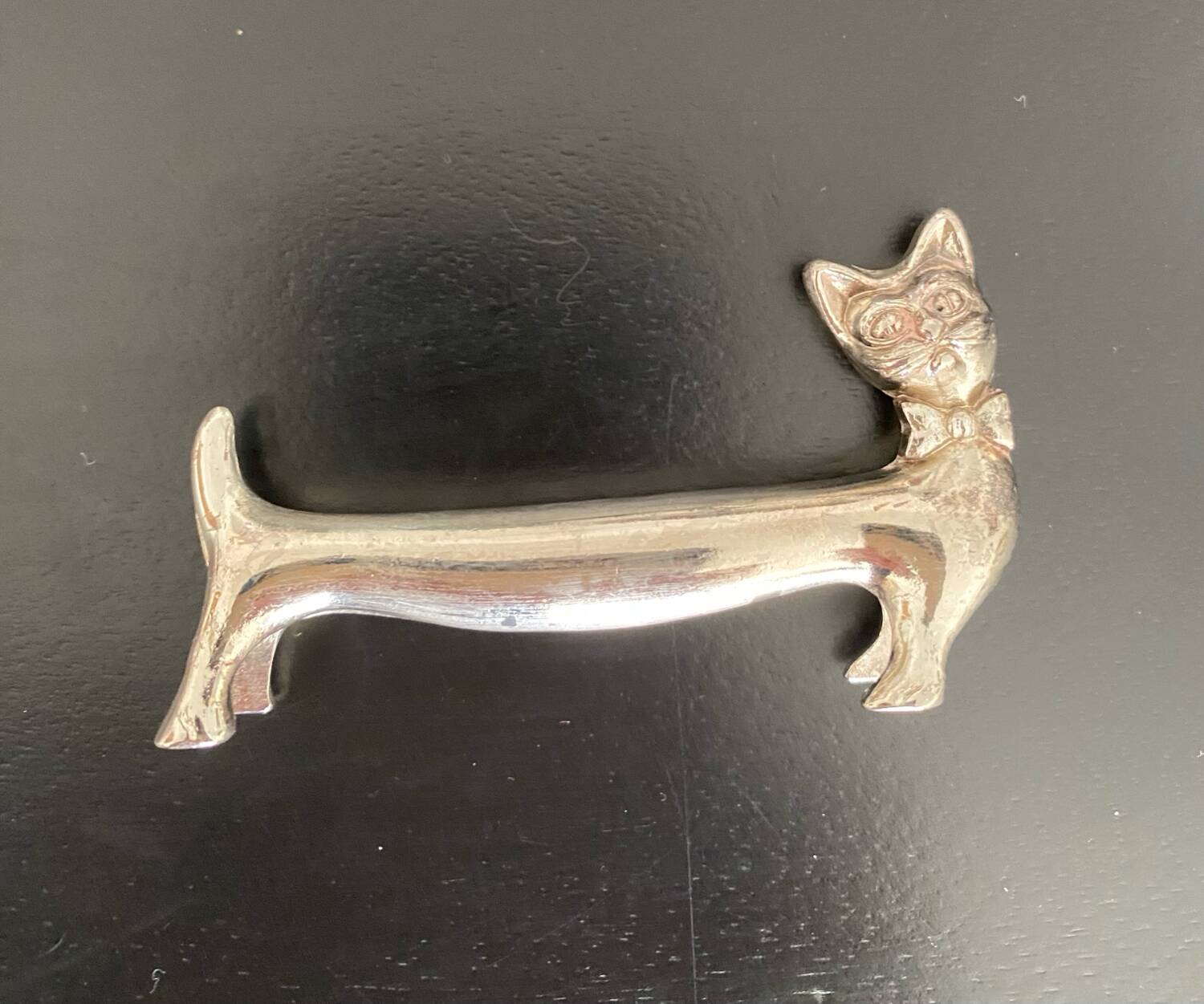 8 various animal knife holders in silver-colored metal