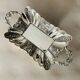 St Louis XV style letter tray, empty pocket, 20th century, in repoussé metal.