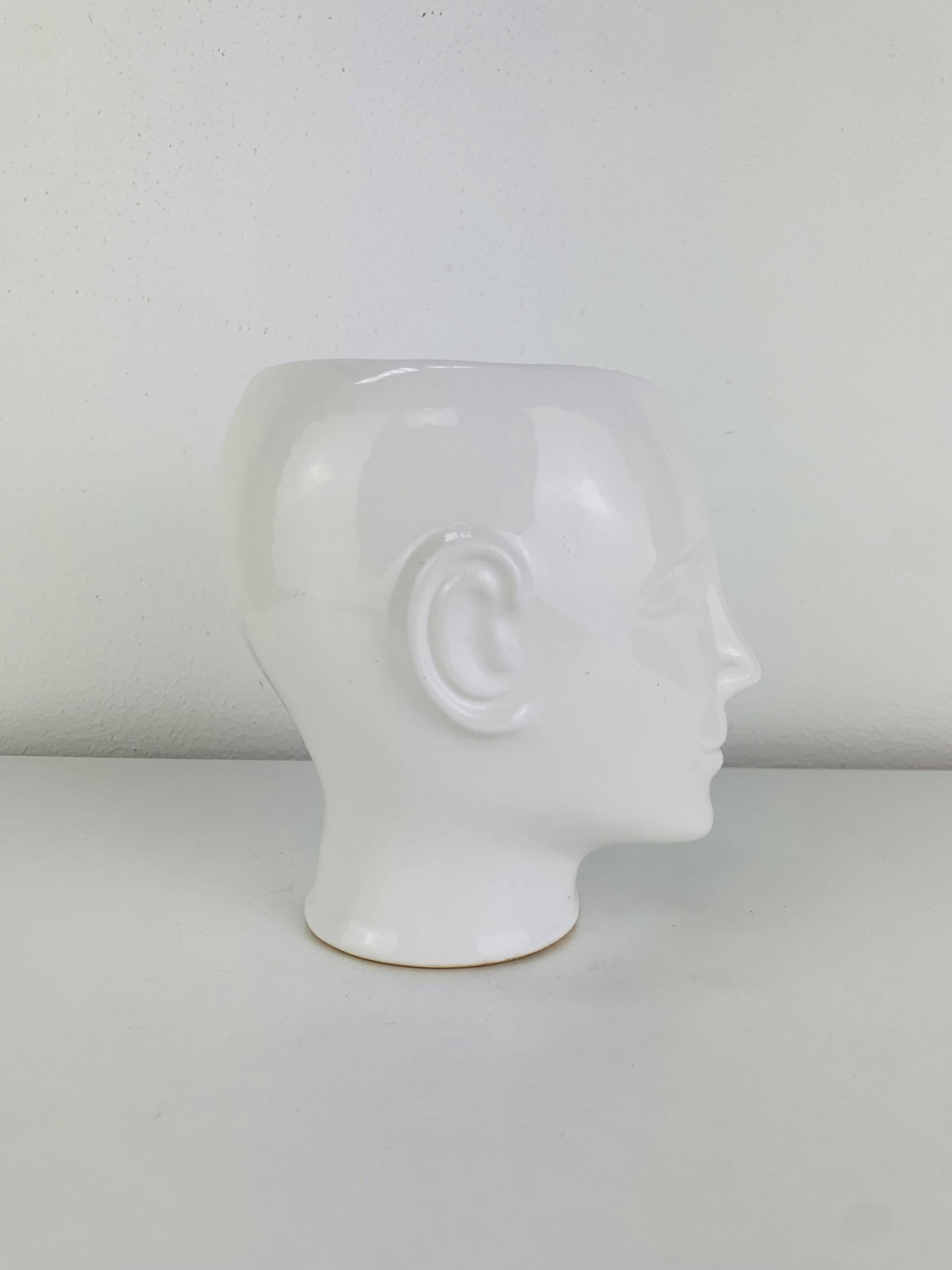 Vintage anthropomorphic ceramic head vase.