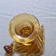 Antique decanter made of amber blown glass