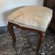 Pair of Italian armchairs from the 1960s with matching ottoman.