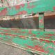 Former school bench patina green red