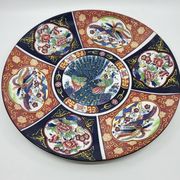 Large Chinese dish signed in Imari porcelain decorated with peacocks and flowers 1970 Vintage