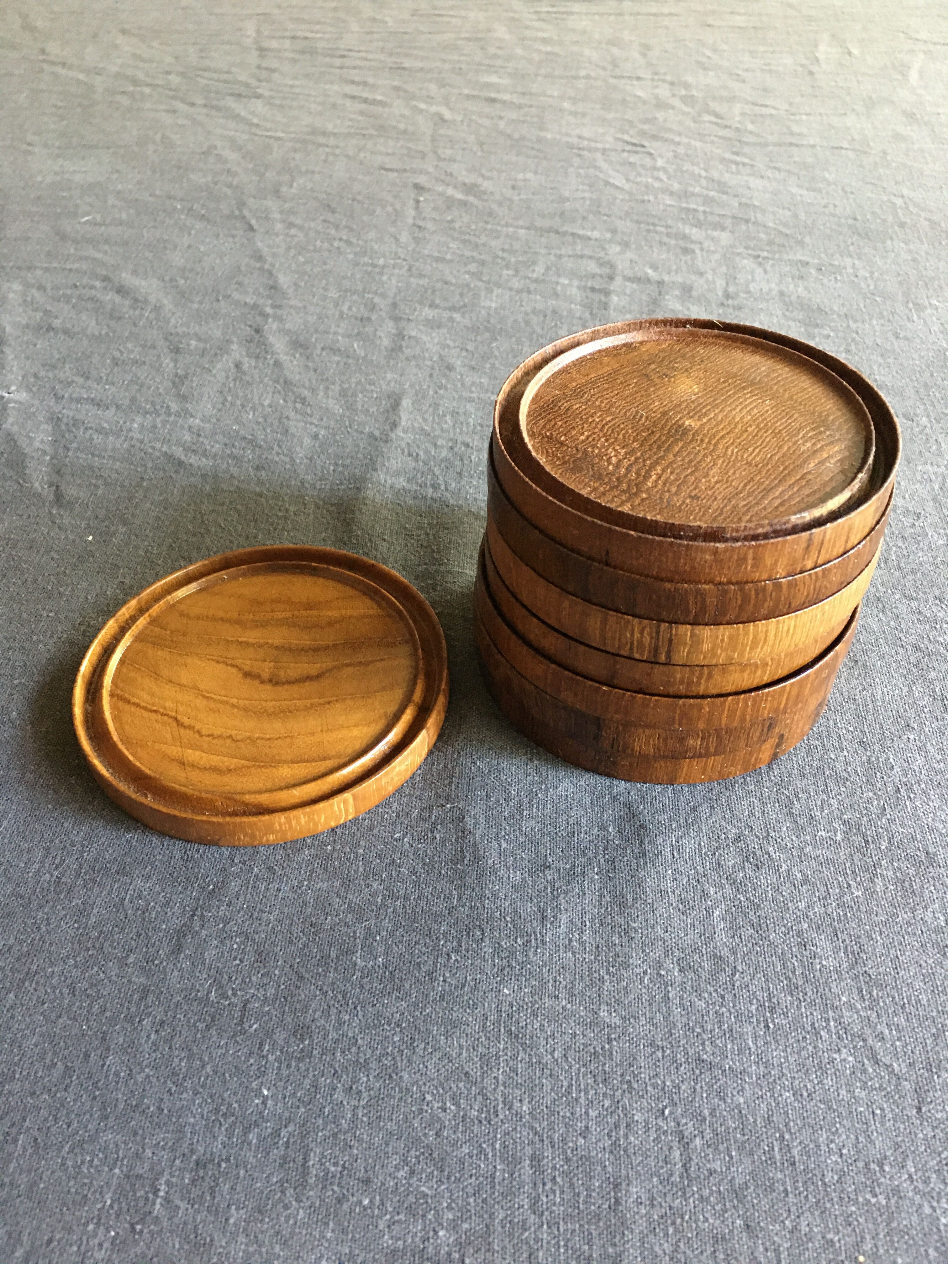 8 coasters and carved wooden box