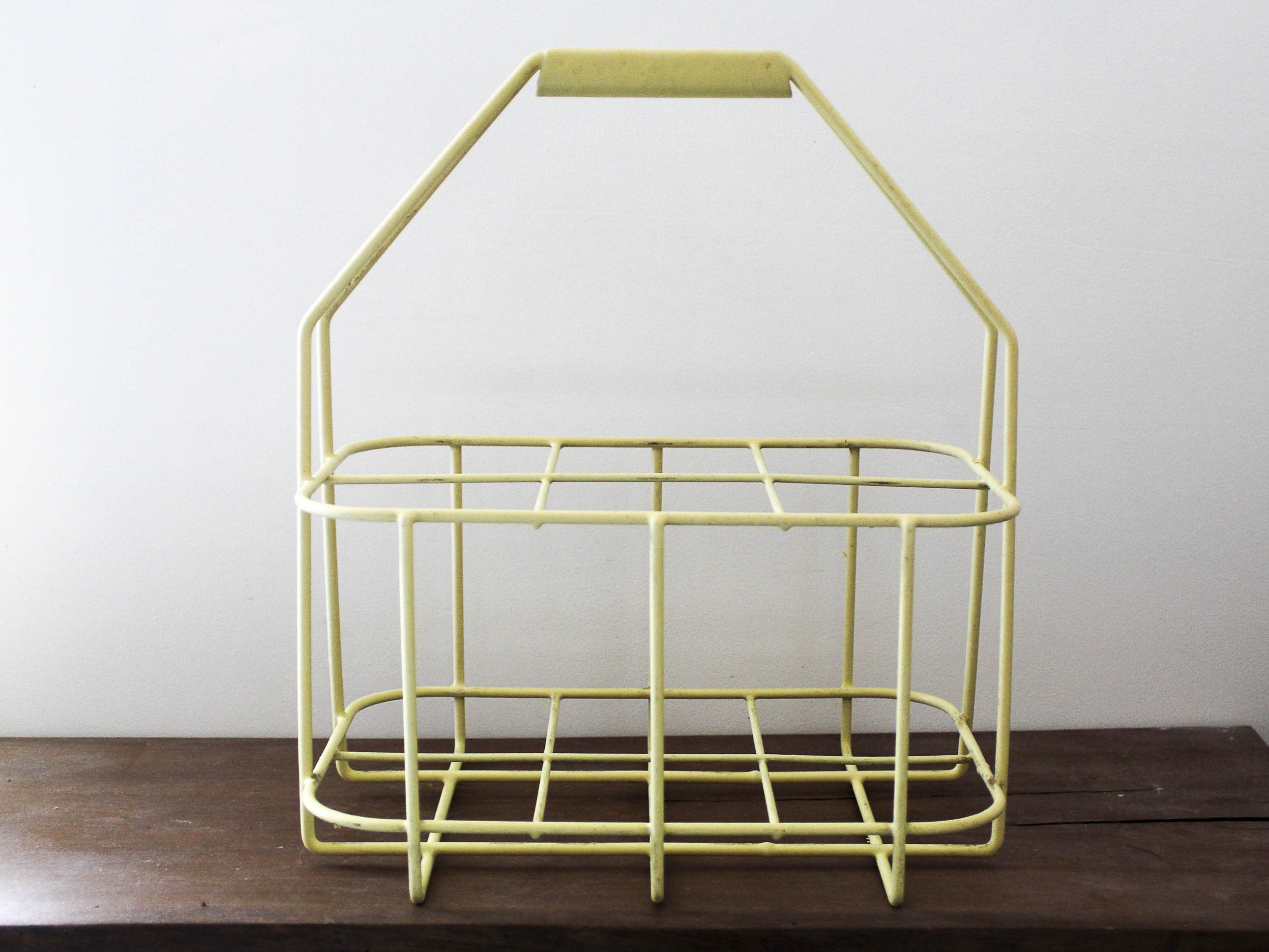 Yellow metal bottle holder