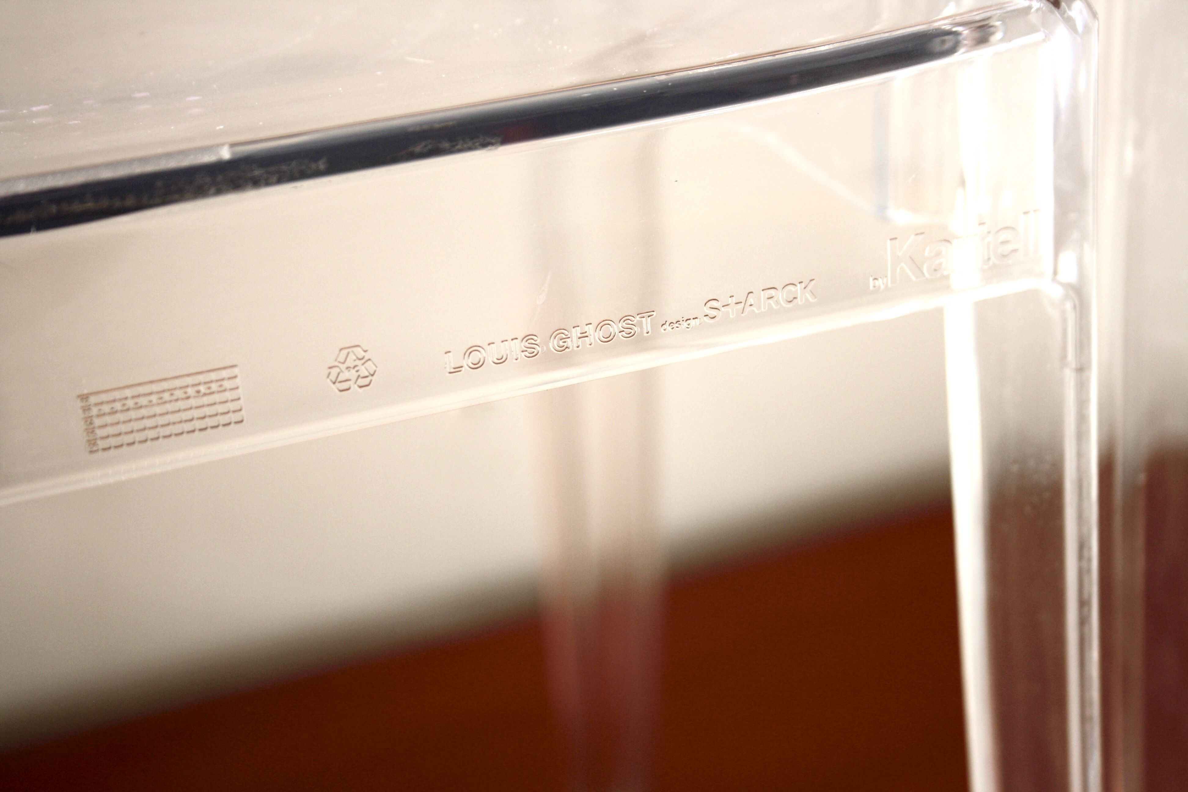 Two Starck chairs transparent model Louis Ghost