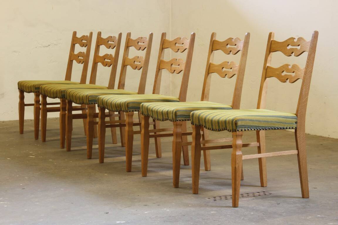 Vintage 1960s brutalist Danish modern oak dining chairs in the style of Henning Kjærnulf