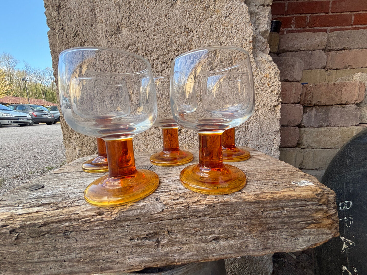 Luminarc footed glasses from the 1970s in orange.