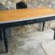 Black pietement farm table - metal strapping - turned feet - 20th century