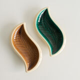 Beige and off-white ceramic ravier