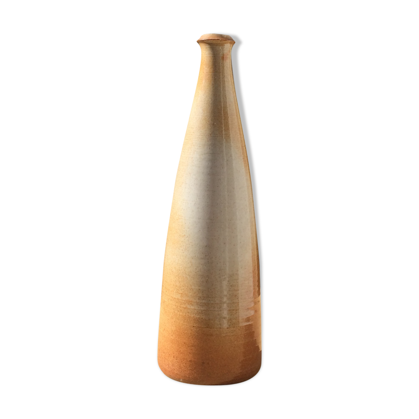Bottle in sandstone or doilies