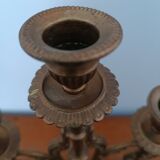 Bronze candlestick with lion head decoration