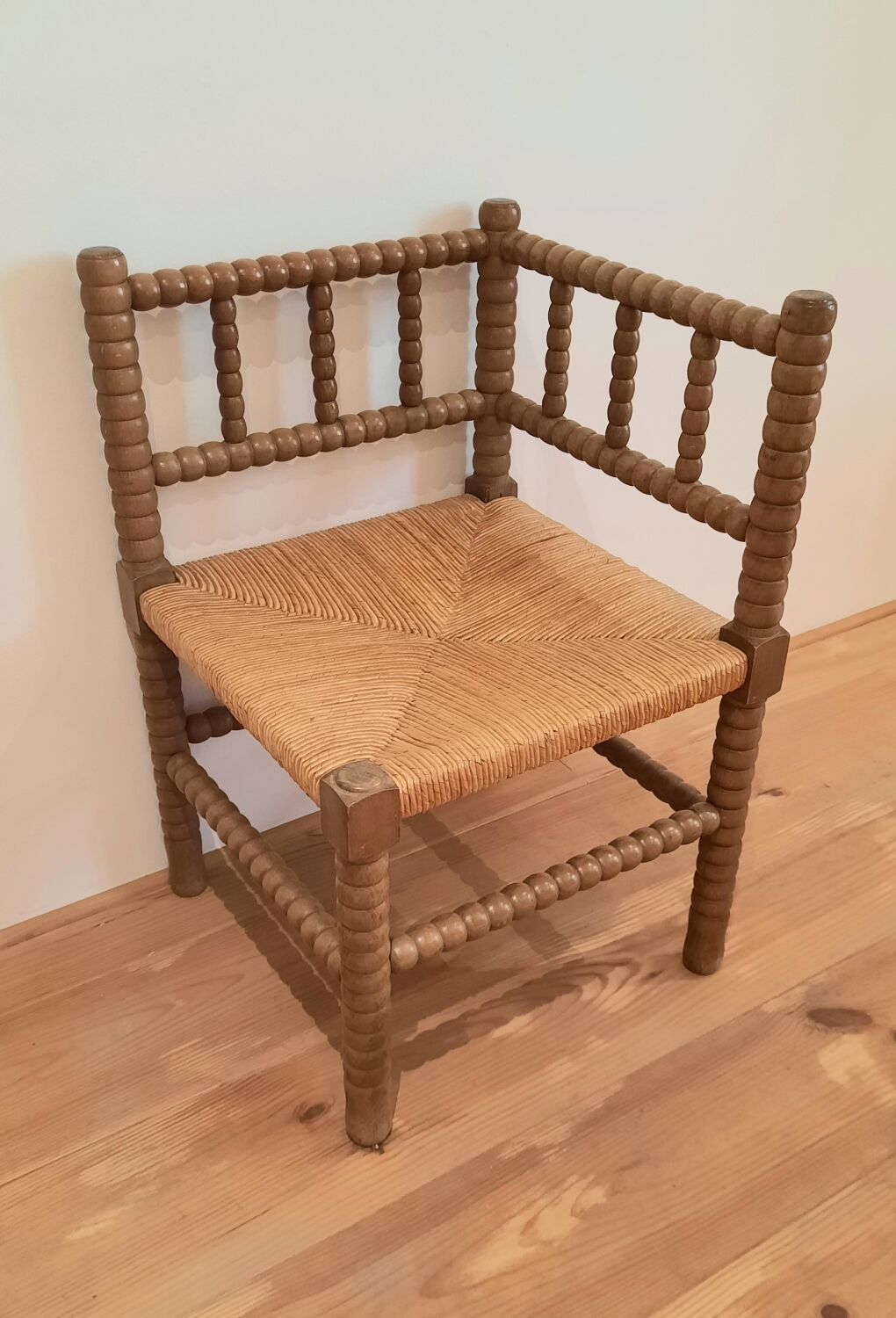 Turned wooden corner chair