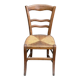 Period rustic chair with a straw seat