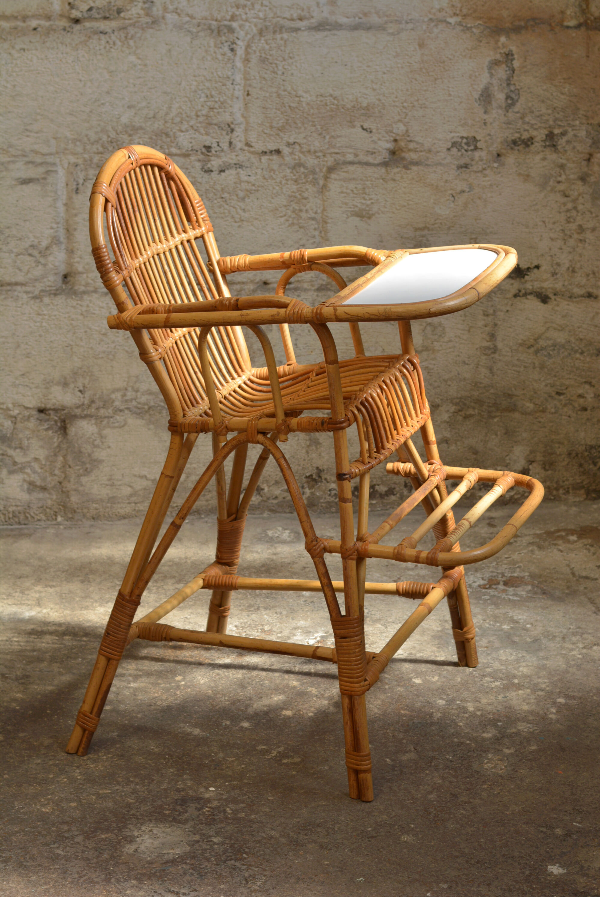 Vintage rattan high chair