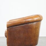 Sheep leather club chair in a cognac color with patina