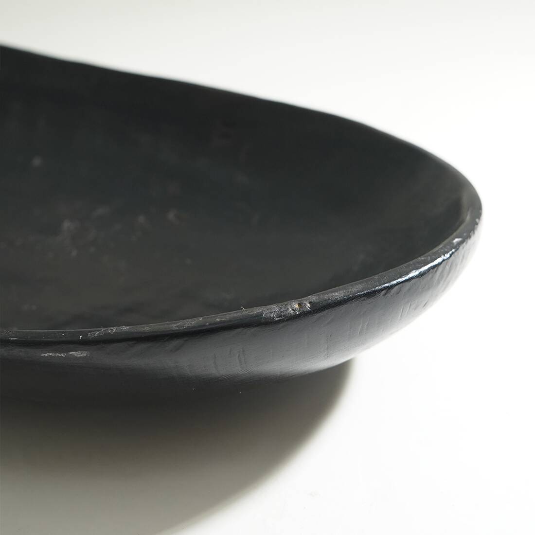 Organic shaped black wooden bowl, 1960s